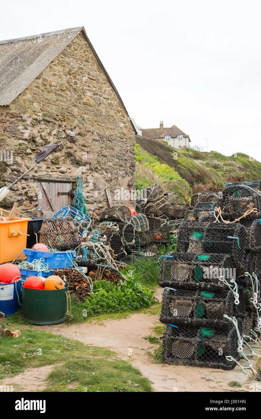 Aragosta tradizionale pots o trappole a Hope Cove, Kingsbridge, Devon, Inghilterra, Regno Unito Foto Stock