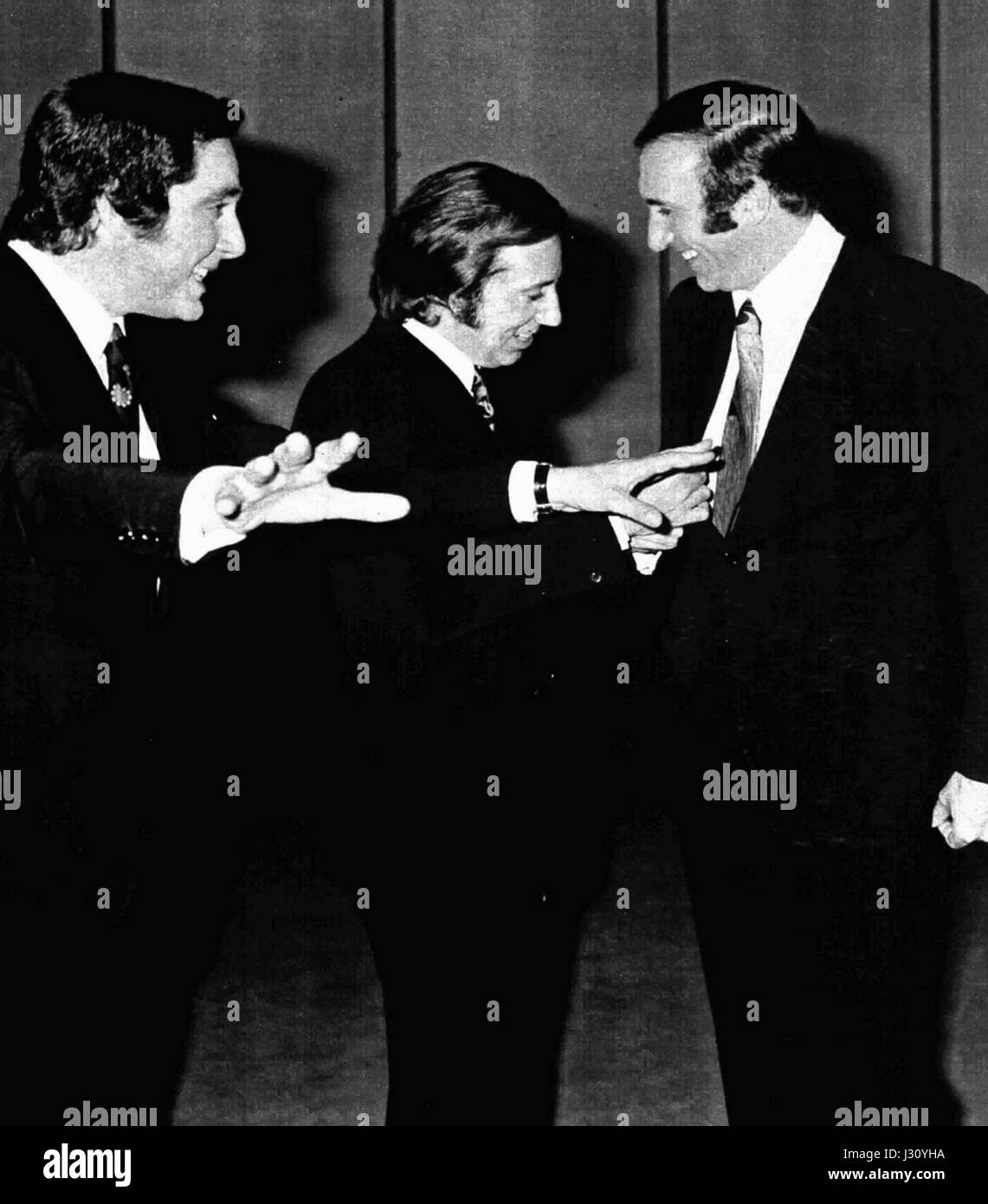 Questo titolo si riferisce a personaggi italiani di rilievo, Corrado, Mike Bongiorno e Pippo Baudo, tutti influenti nell'intrattenimento italiano. Il loro lavoro in televisione e media ha giocato un ruolo significativo nel plasmare la cultura pop italiana. Foto Stock