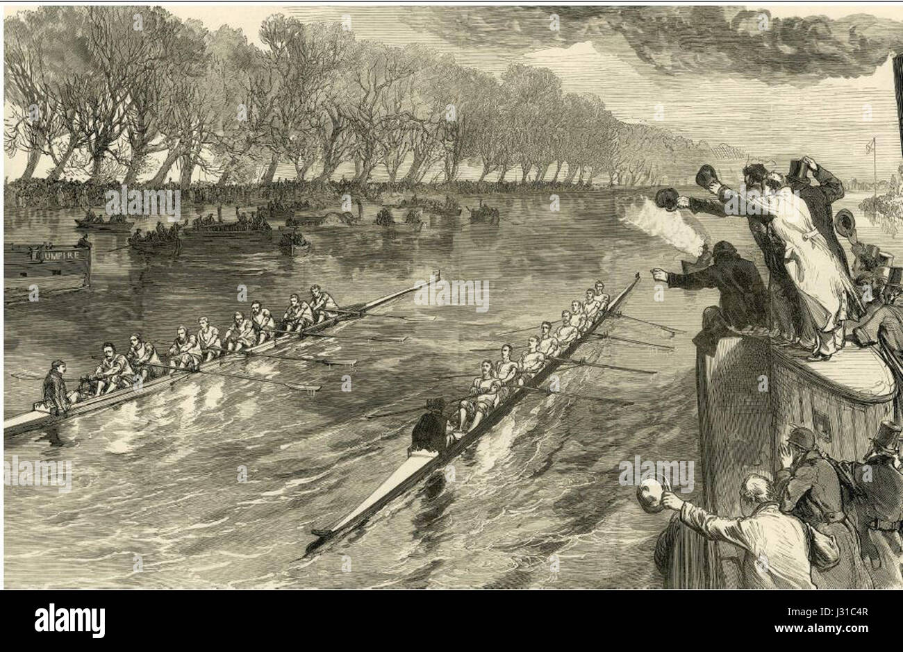 Questa immagine raffigura una gara di barche del 1877, catturando lo spirito competitivo degli sport acquatici della fine del XIX secolo. La scena mette in risalto i tradizionali design delle barche e le tecniche di gara dell'epoca, mostrando sia l'atletismo che la natura ricreativa del canottaggio durante quel periodo. Foto Stock
