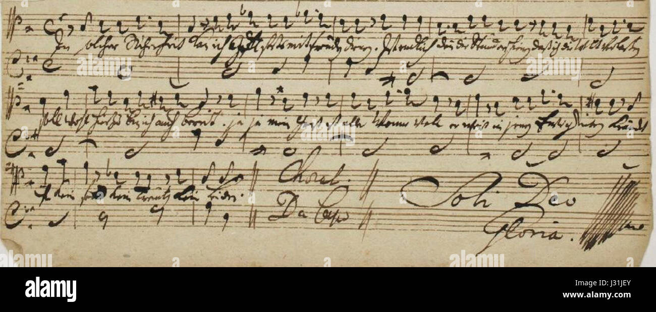 "Soli Deo Gloria" (SDG) è un termine latino che significa "Gloria a Dio solo". Nel contesto della musica di Bach, appare alla fine di molte delle sue composizioni, indicando la sua dedica dell'opera alla gloria di Dio. Foto Stock