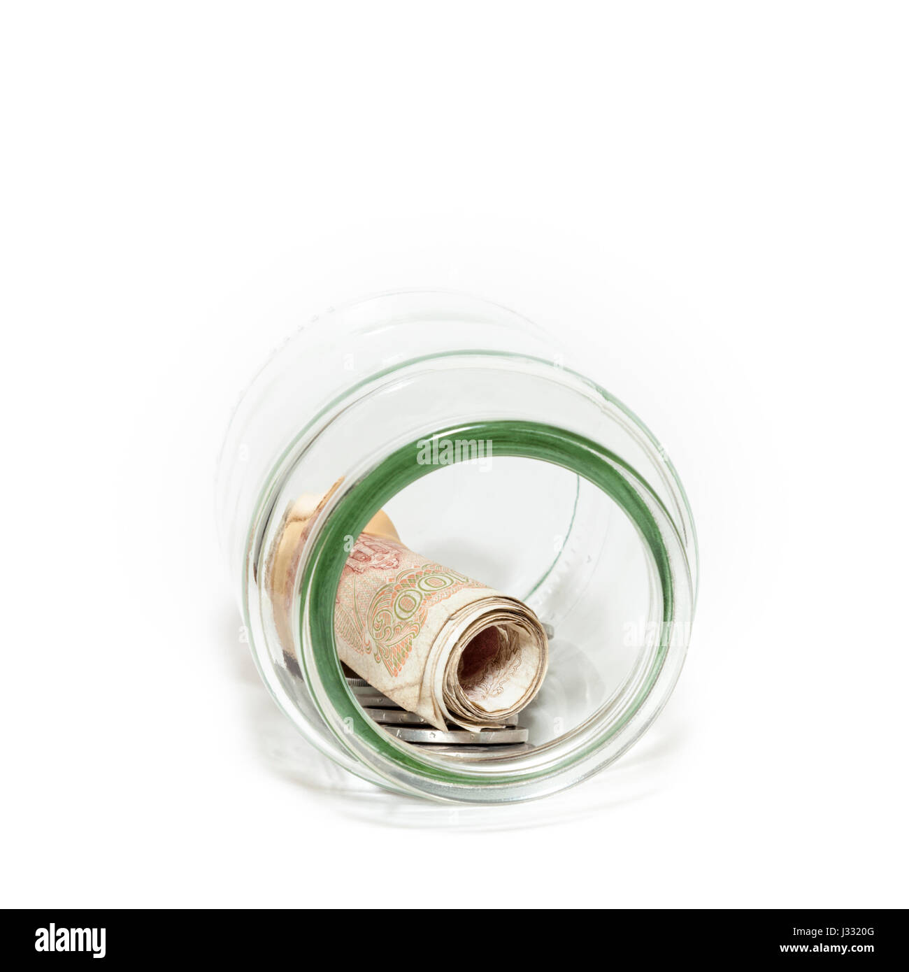 Il Greco antico denaro. Dracma in monete e banconote salvati in un vasetto di vetro Foto Stock