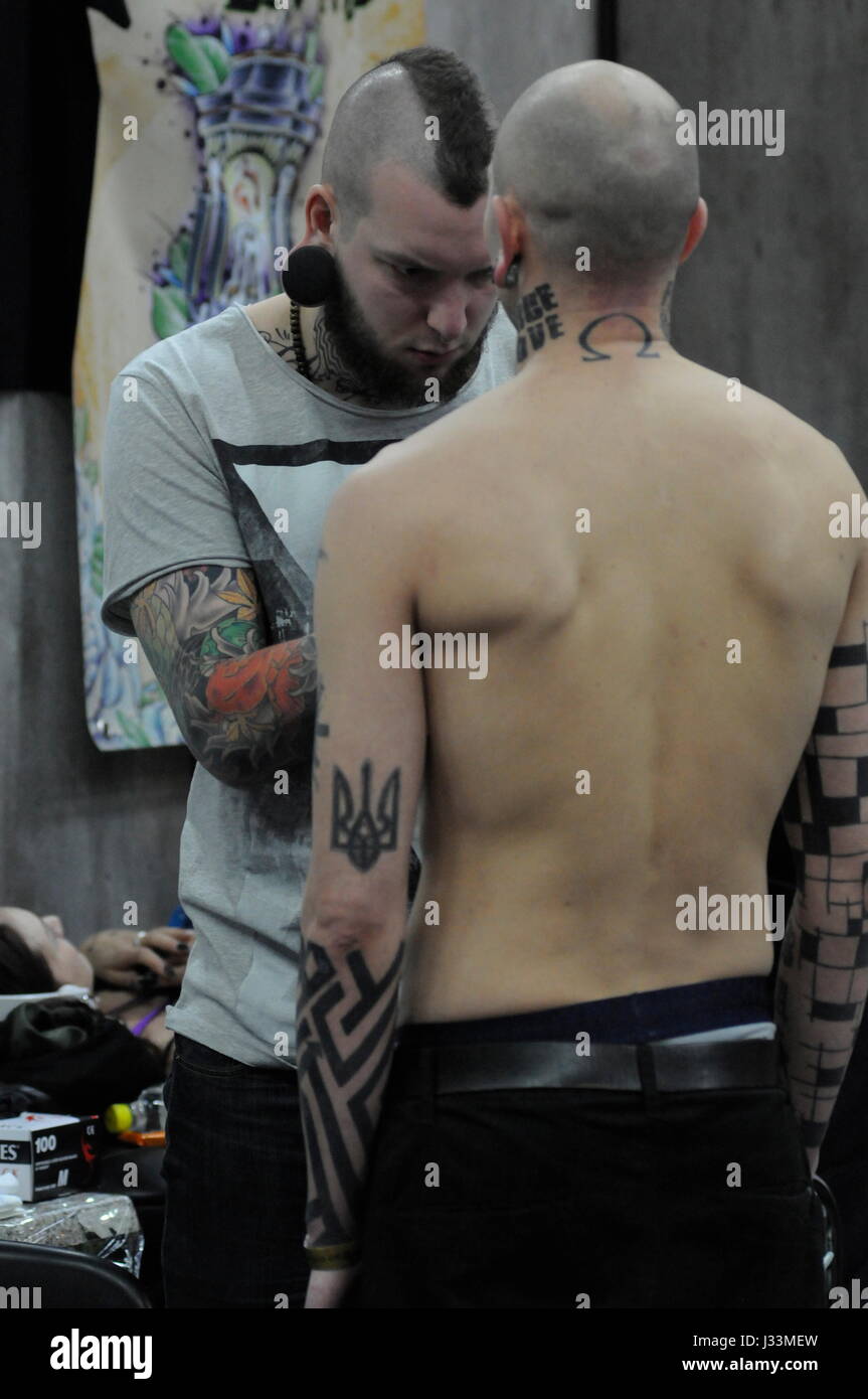 International di tatuaggi e piercing convention di Lione Foto Stock