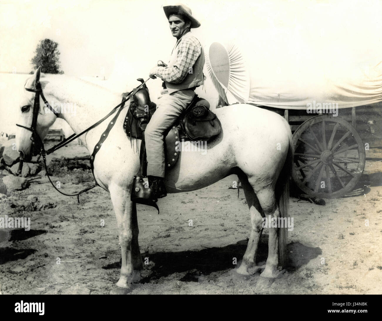 Un uomo a cavallo in stile occidentale, Italia Foto Stock