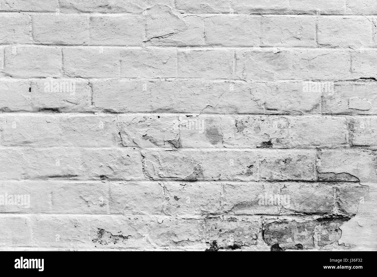 Vecchio weathered bianco muro di mattoni texture con buccia di vernice modello di superficie Foto Stock