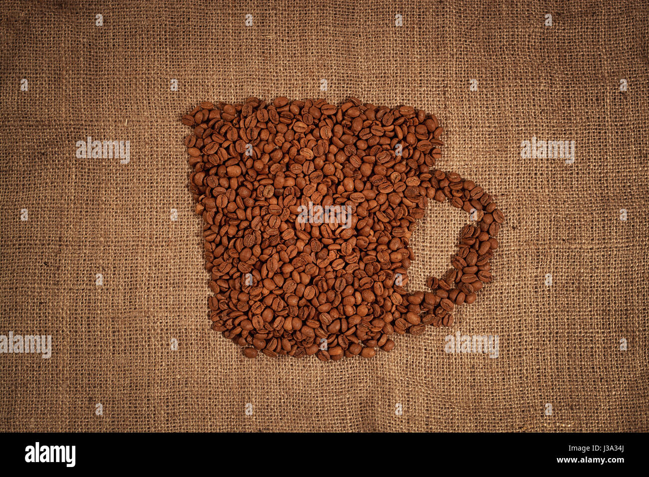 Tazza di caffè in grani texture Foto Stock