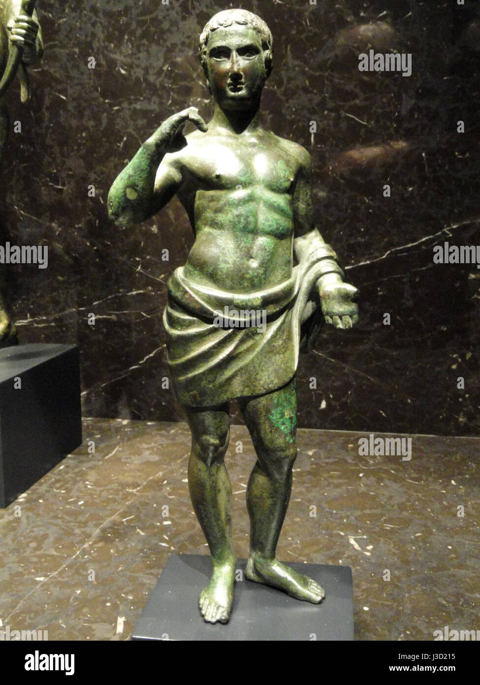 La statuetta etrusca, databile dal III al i secolo a.C., è un significativo esempio di arte etrusca antica. Questa scultura, ospitata nel Museo d'Arte Nelson Atkins, riflette la cultura e l'artigianato dell'antica Italia. Foto Stock