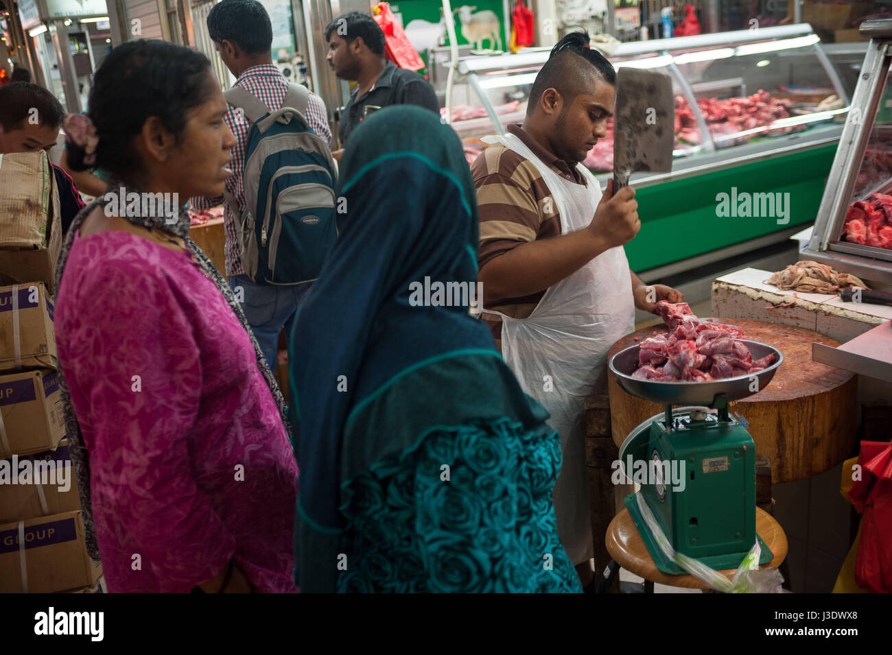 Singapore Repubblica di Singapore, Asia, una macelleria al mercato Tekka Foto Stock