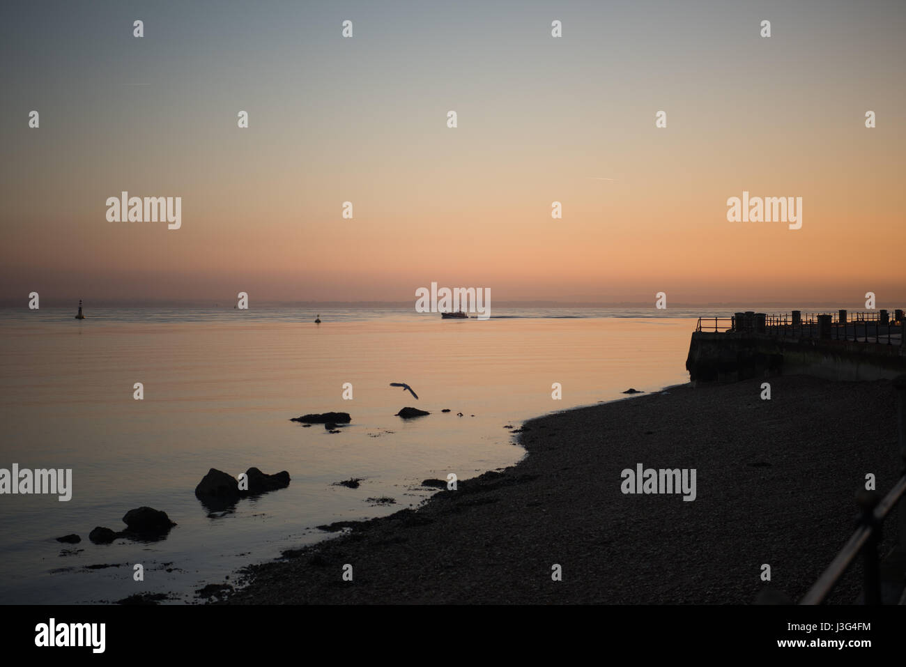 Mattina Beach Sunrise, Cowes Isola di Wight. Foto Stock