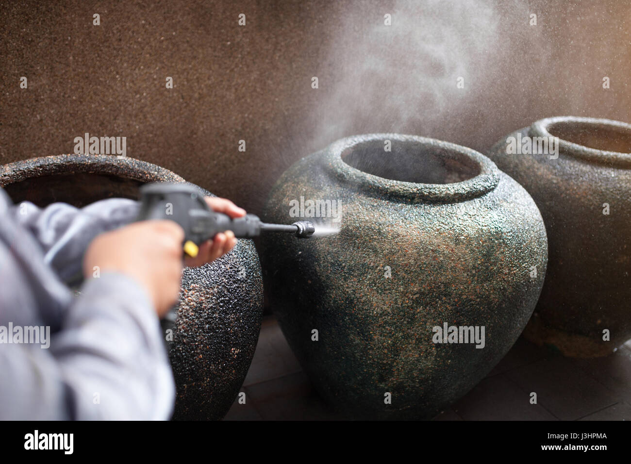 Scopo la pulizia con acqua ad alta pressione pulitore. Foto Stock