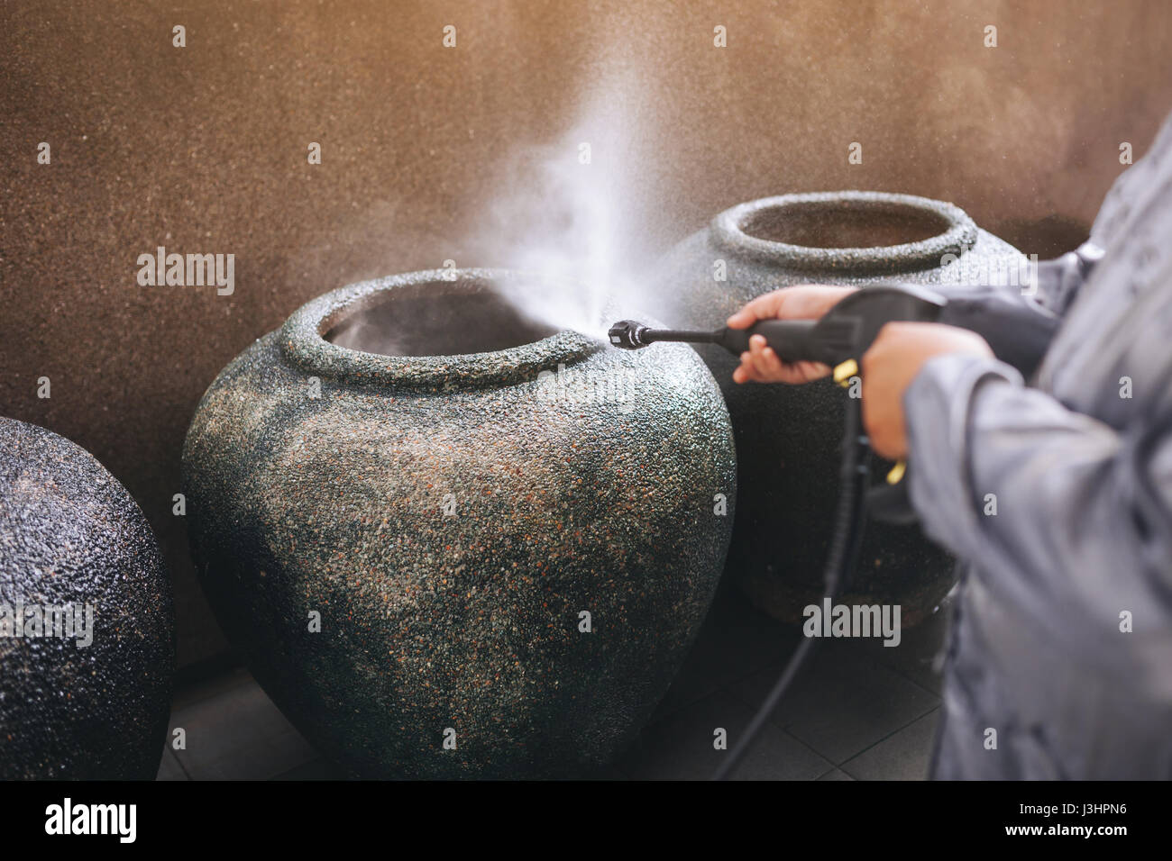 Scopo la pulizia con acqua ad alta pressione pulitore. Foto Stock