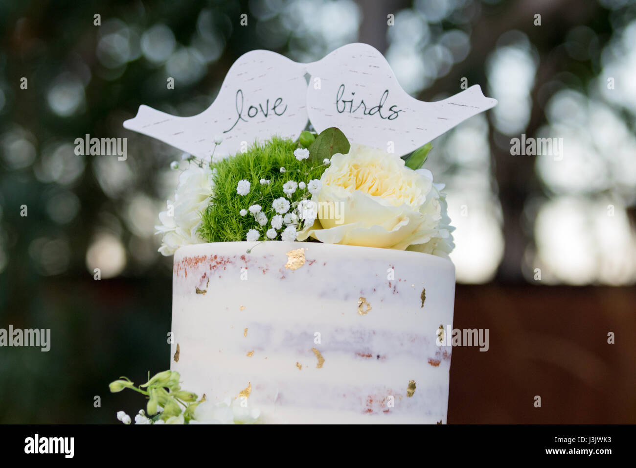 Torta di Nozze con scaglie d'Oro Foto Stock