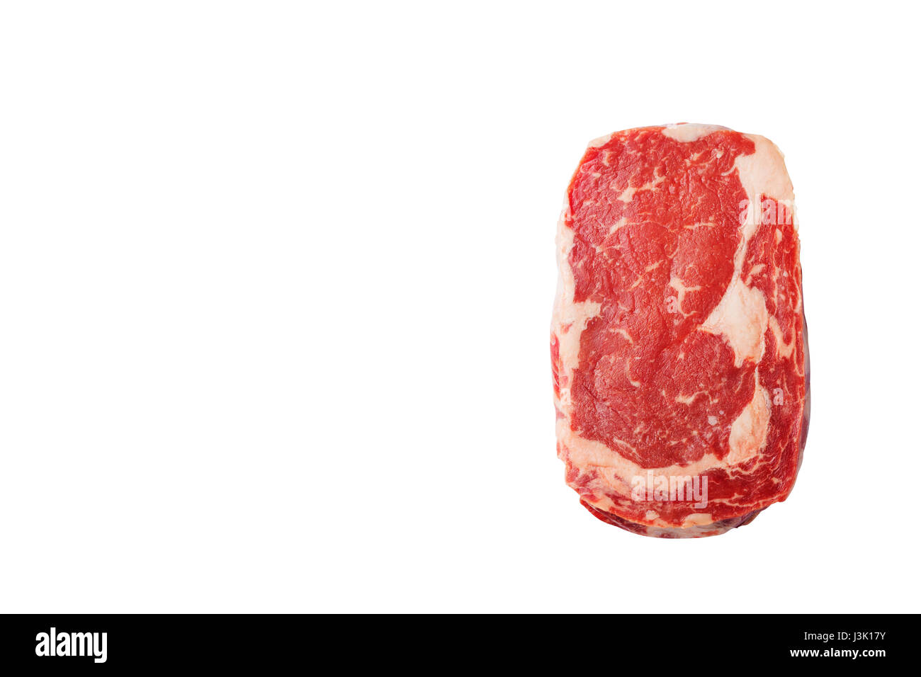 Crudo fresco bistecca di manzo isolato su bianco. Vista dall'alto. Spazio di copia Foto Stock