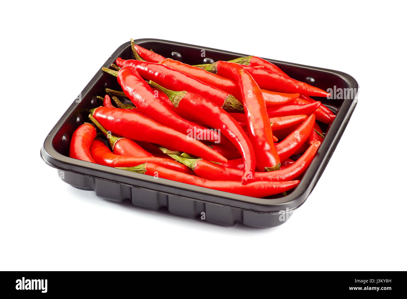 Cumulo di peperoncino rosso sul vassoio di retail Foto Stock Cumulo di peperoncino rosso sul vassoio di retail Foto Stock