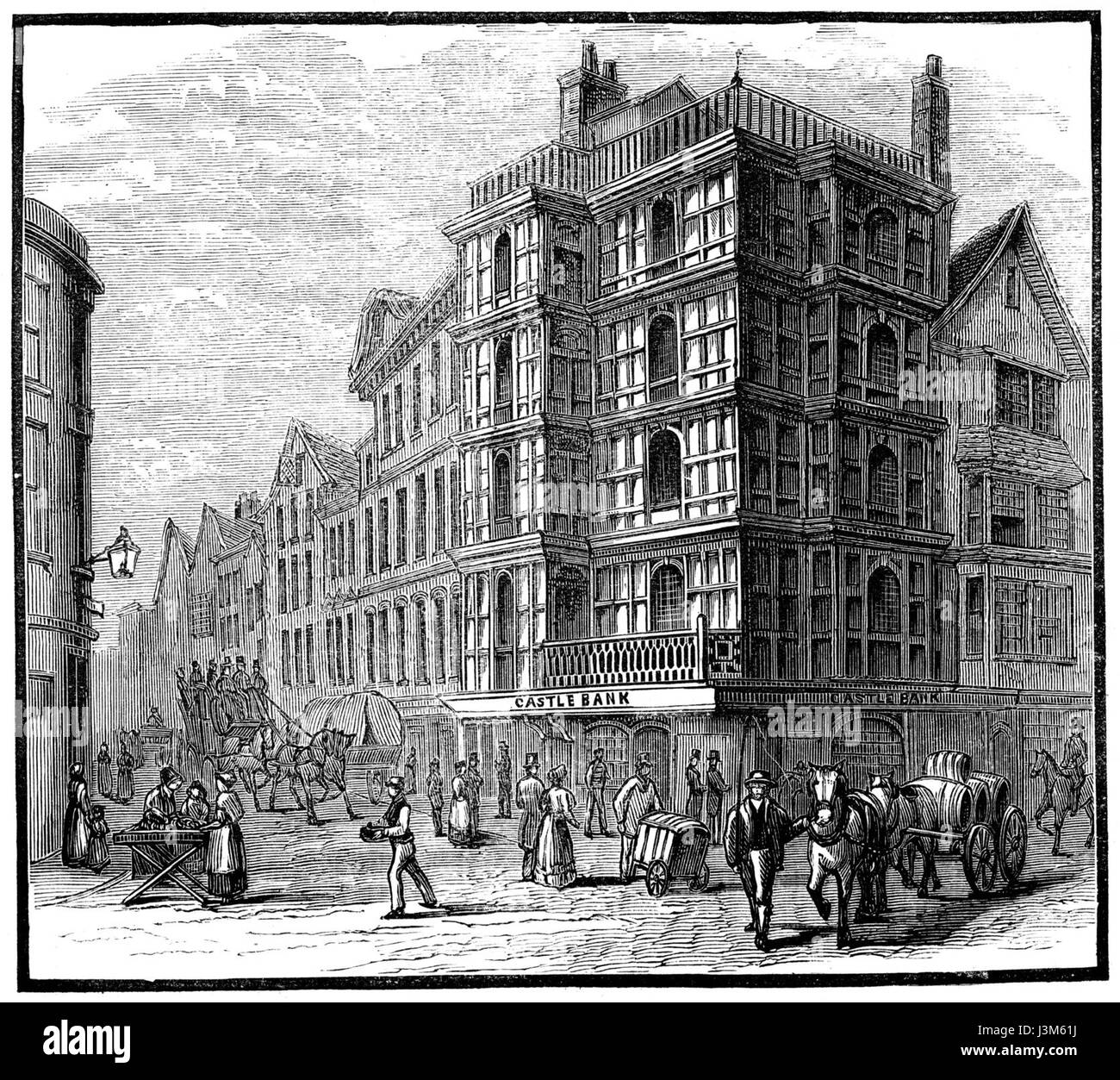 Questa fotografia cattura una casa storica situata all'angolo tra High Street e Wine Street a Bristol. L'edificio rappresenta lo stile architettonico tipico della zona, mostrando la ricca storia e lo sviluppo urbano del cityâ. Foto Stock