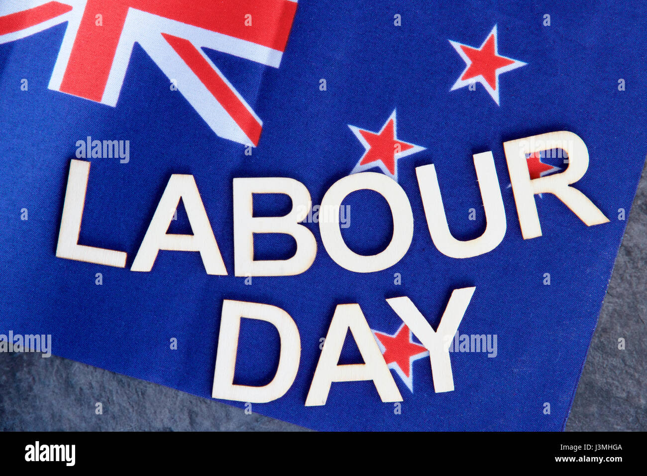 La giornata del lavoro segnaletica sulla bandiera della Nuova Zelanda. Foto Stock