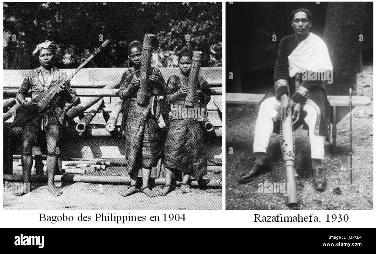 Questa opera raffigura musicisti che suonano il valiha, un tradizionale zither a tubo, comunemente associato sia alle Filippine che al Madagascar, evidenziando il significato interculturale degli strumenti musicali nel sud-est asiatico e nell'Oceano Indiano. Foto Stock