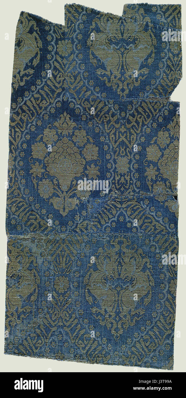 "Seta dell'Ilkhanato" si riferisce ai tessuti prodotti durante il periodo dell'Ilkhanato, parte dell'Impero mongolo. Queste sete erano note per i loro intricati disegni e furono molto apprezzate nel commercio durante il XIII e XIV secolo. Foto Stock