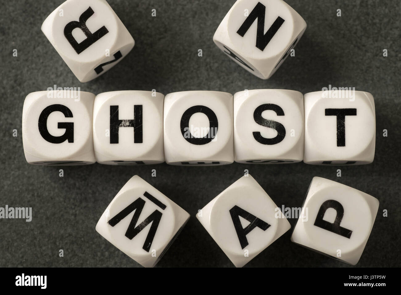 Parola fantasma su bianco cubetti giocattolo Foto Stock