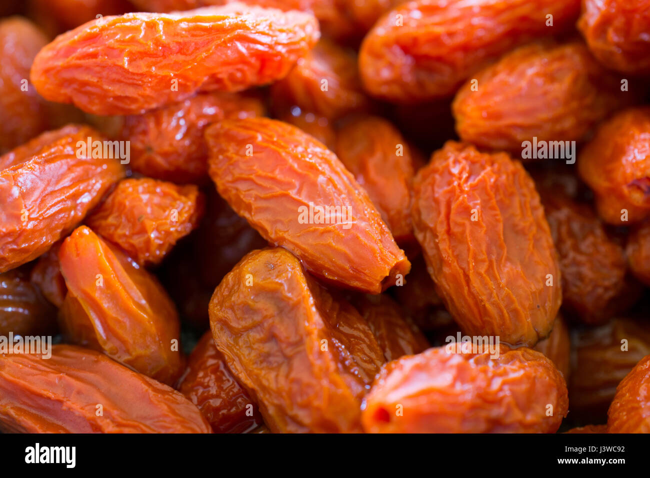 Bacche di Goji closeup. Profondità di campo. Foto Stock