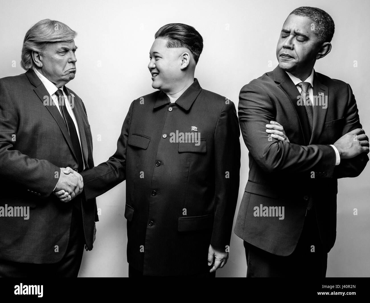 Presidente Donald Trump J, il Presidente Barack Obama e il leader supremo della Corea del nord Kim Jong-Un lookalikes soddisfare per un servizio fotografico di Hong Kong. Foto Stock
