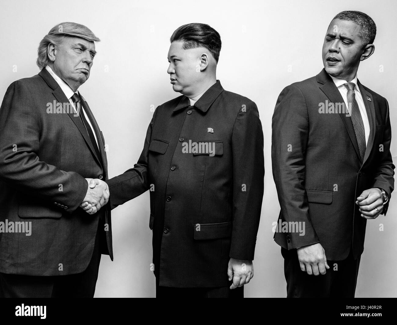 Presidente Donald Trump J, il Presidente Barack Obama e il leader supremo della Corea del nord Kim Jong-Un lookalikes soddisfare per un servizio fotografico di Hong Kong. Foto Stock