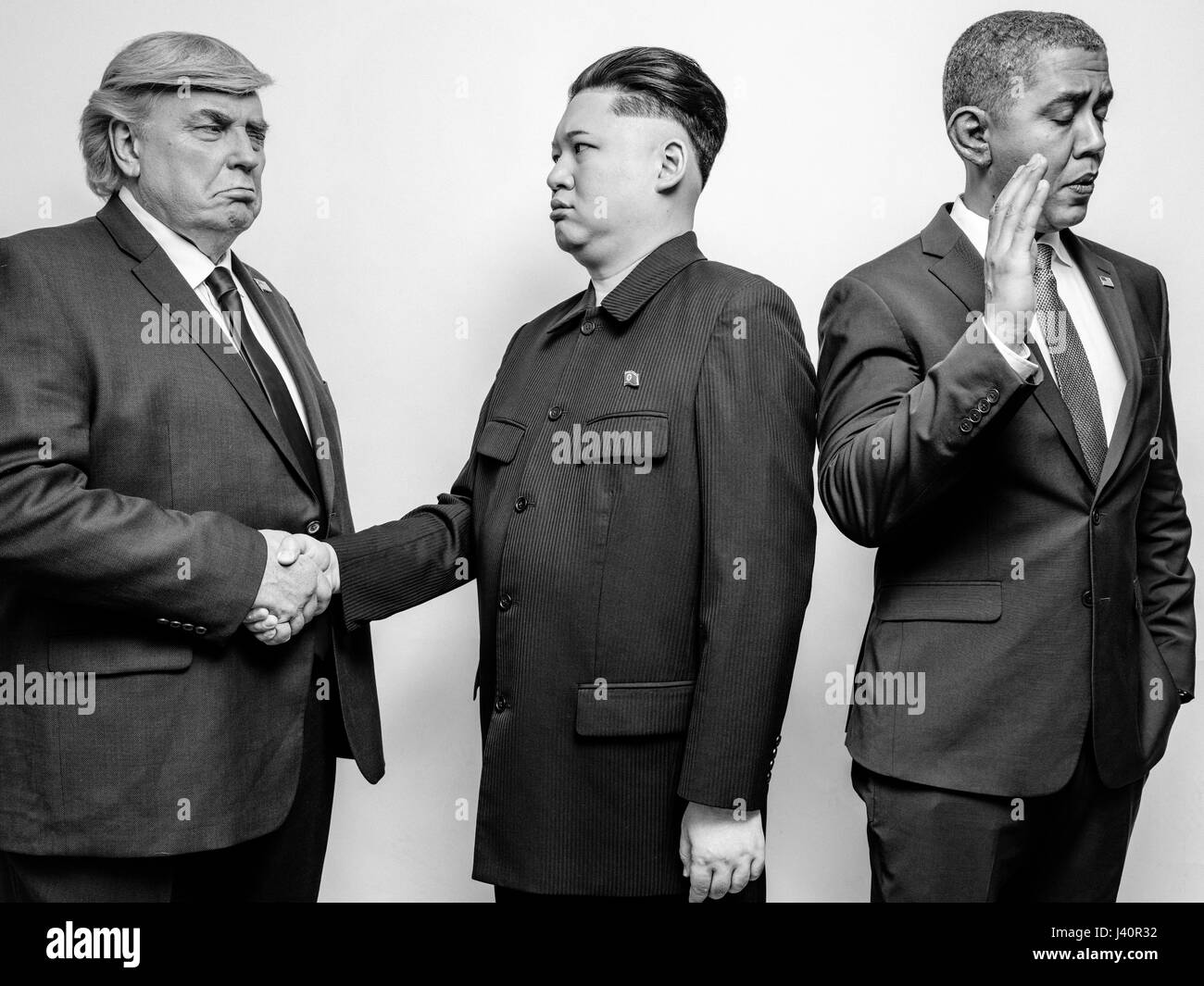 Presidente Donald Trump J, il Presidente Barack Obama e il leader supremo della Corea del nord Kim Jong-Un lookalikes soddisfare per un servizio fotografico di Hong Kong. Foto Stock