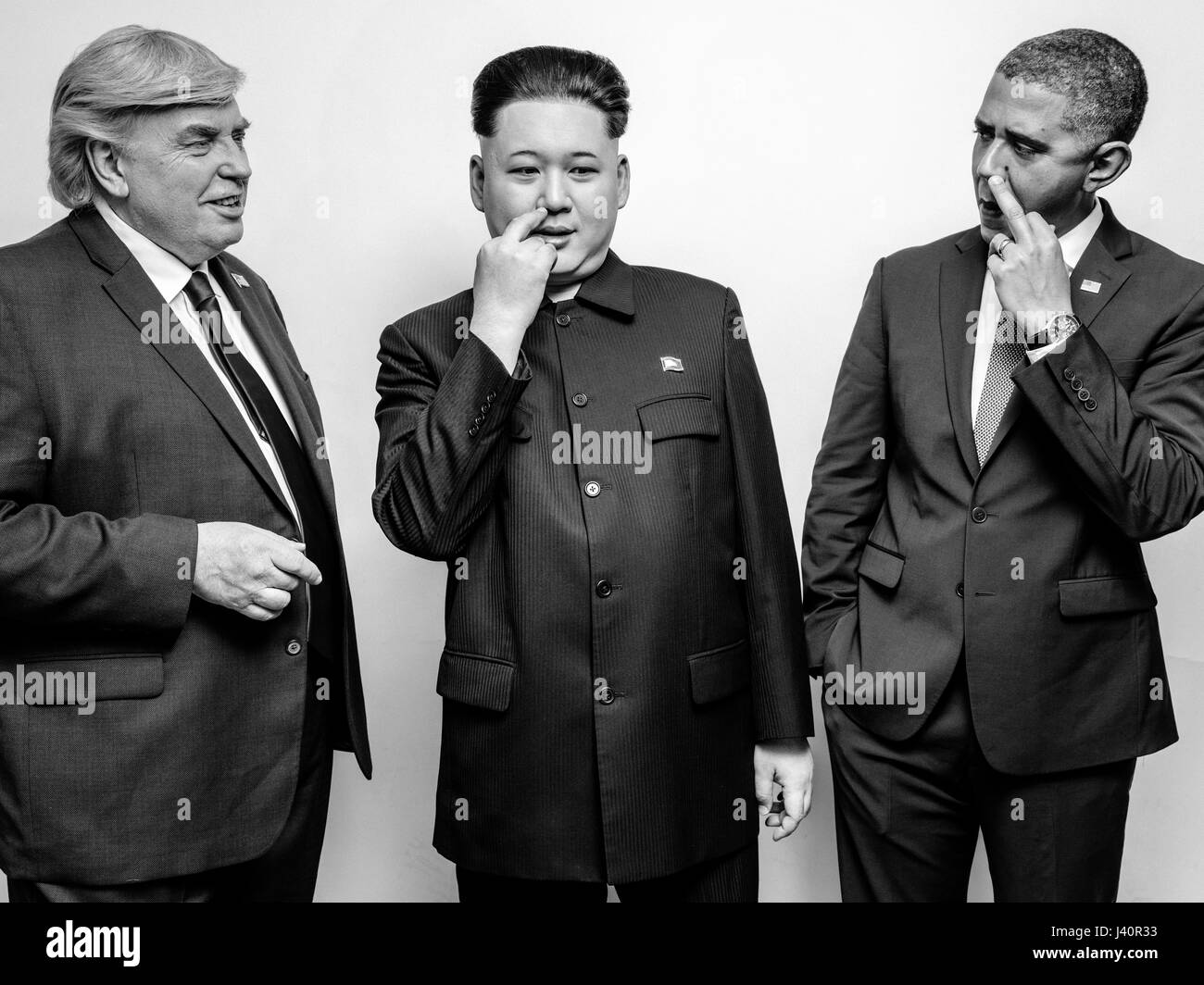 Presidente Donald Trump J, il Presidente Barack Obama e il leader supremo della Corea del nord Kim Jong-Un lookalikes soddisfare per un servizio fotografico di Hong Kong. Foto Stock