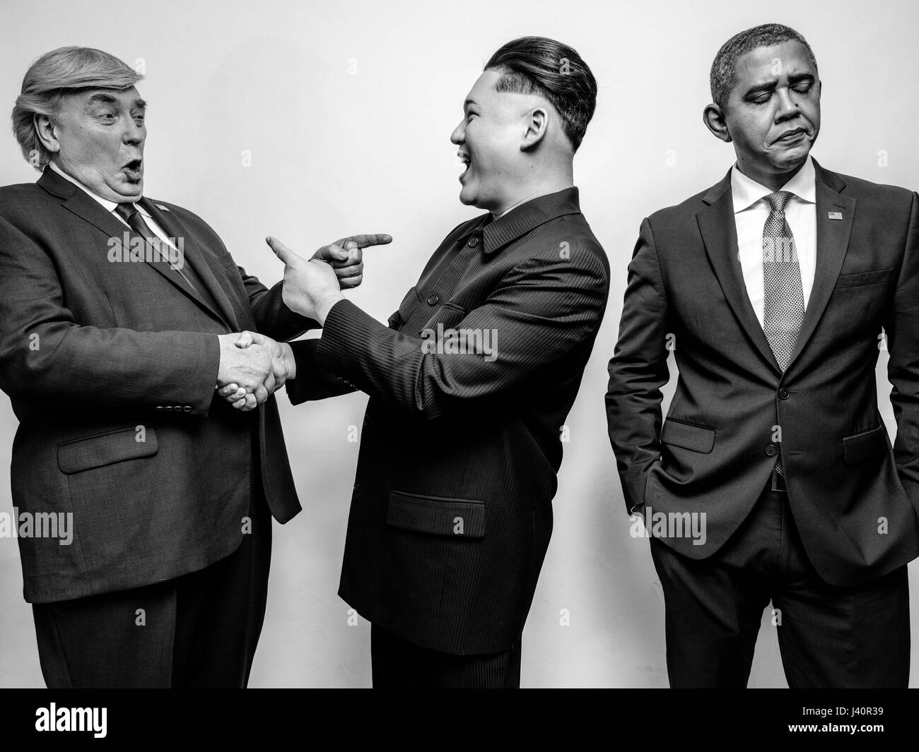 Presidente Donald Trump J, il Presidente Barack Obama e il leader supremo della Corea del nord Kim Jong-Un lookalikes soddisfare per un servizio fotografico di Hong Kong. Foto Stock