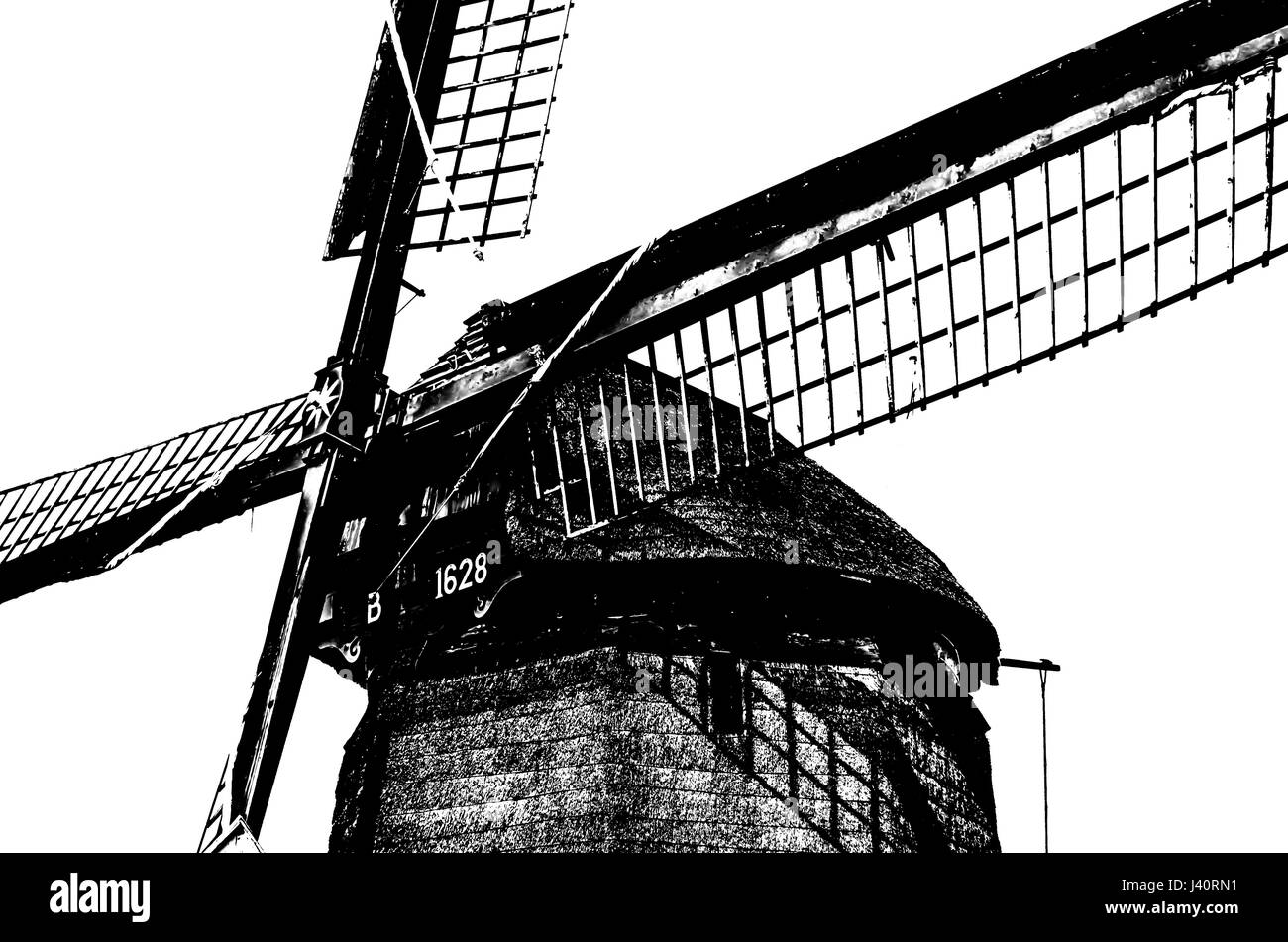 Silhouette in bianco e nero di un mulino a vento olandese Foto Stock