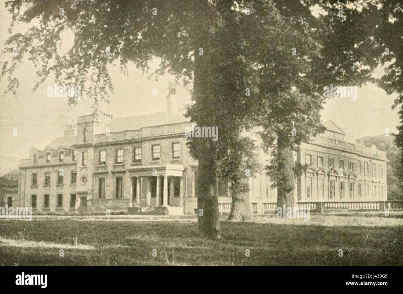 Lamport Hall, una storica tenuta inglese, è raffigurata in una fotografia del 1898, che mostra le sue caratteristiche architettoniche e il suo significato storico come parte del patrimonio dell'Inghilterra. Foto Stock