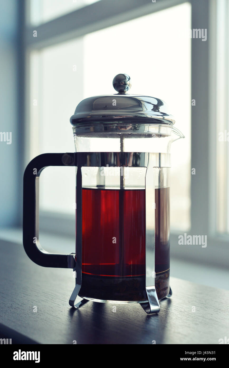 Stampa francese sul divano nel soggiorno closeup. Foto Stock