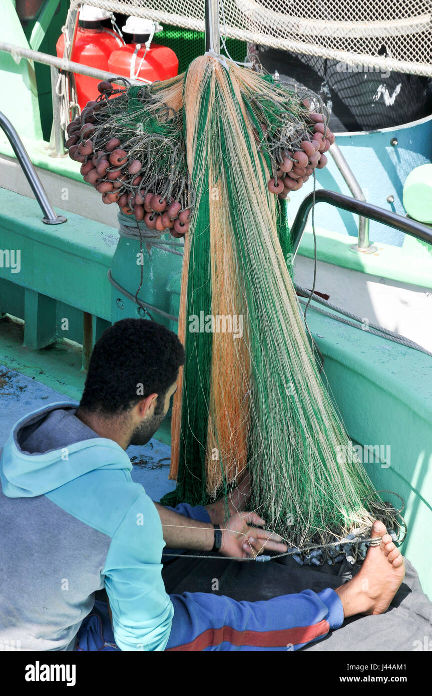 Correzioni del pescatore fishnets in Limassol, Cipro Foto Stock