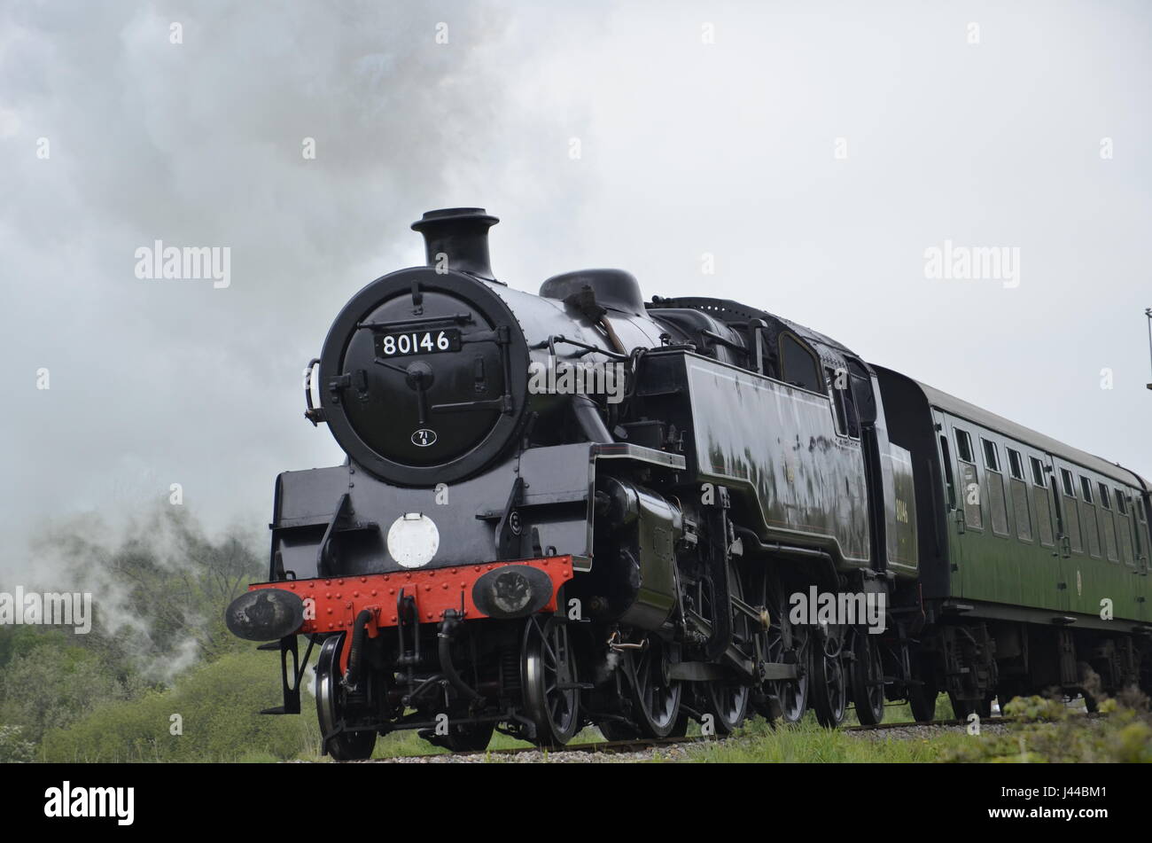 Un Standard 4MT il serbatoio del vapore sul treno la stazione ferroviaria di Swanage nel Dorset Foto Stock