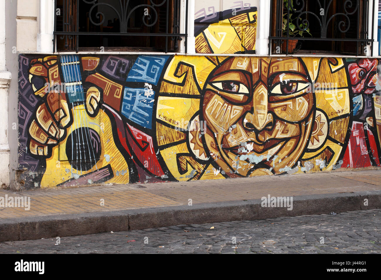 Carta murale in San Telmo district, sun e chitarra. Tango. Foto Stock