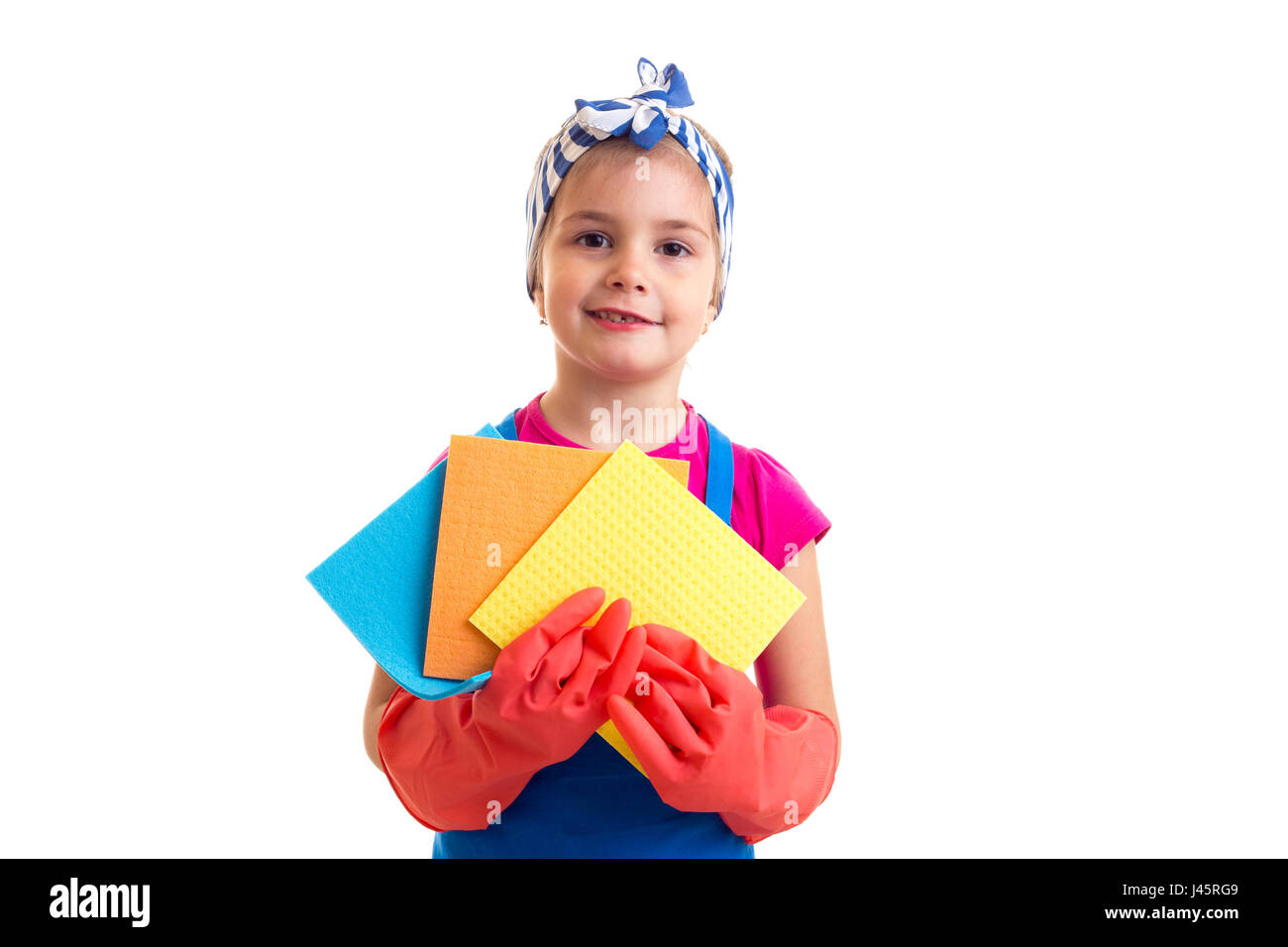 La ragazza di grembiuli e guanti holding scamosciati Foto Stock