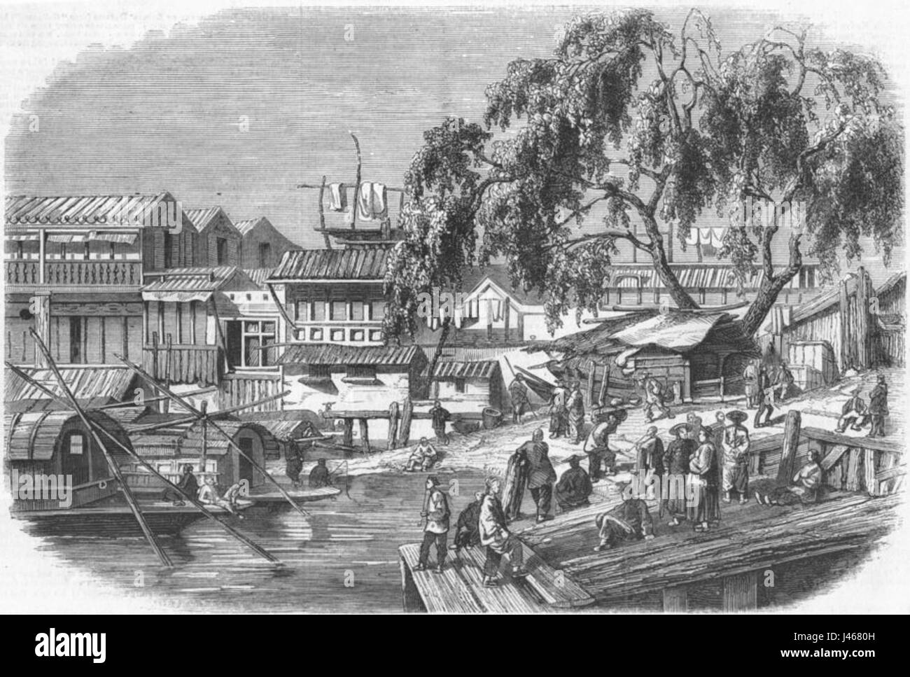 Questa rappresentazione di un luogo di sbarco a Canton durante le guerre dell'oppio mostra gli eventi significativi che hanno portato al coinvolgimento britannico in Cina. Le guerre dell'oppio, combattute a metà del XIX secolo, furono fondamentali nel plasmare le relazioni sino-britanniche e la storia del commercio globale. Foto Stock