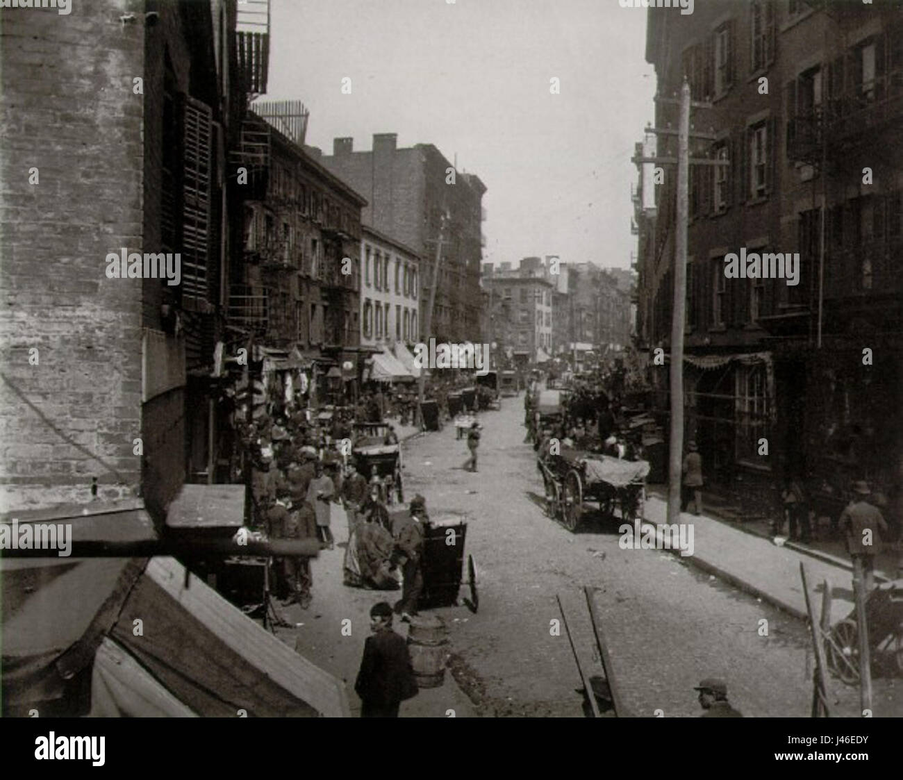 Mulberry Bend è un quartiere storico di New York, famoso per essere stato documentato dal fotografo Jacob Riis. Il suo lavoro catturò le dure condizioni di vita nei distretti di residenza durante la fine del XIX secolo. Foto Stock
