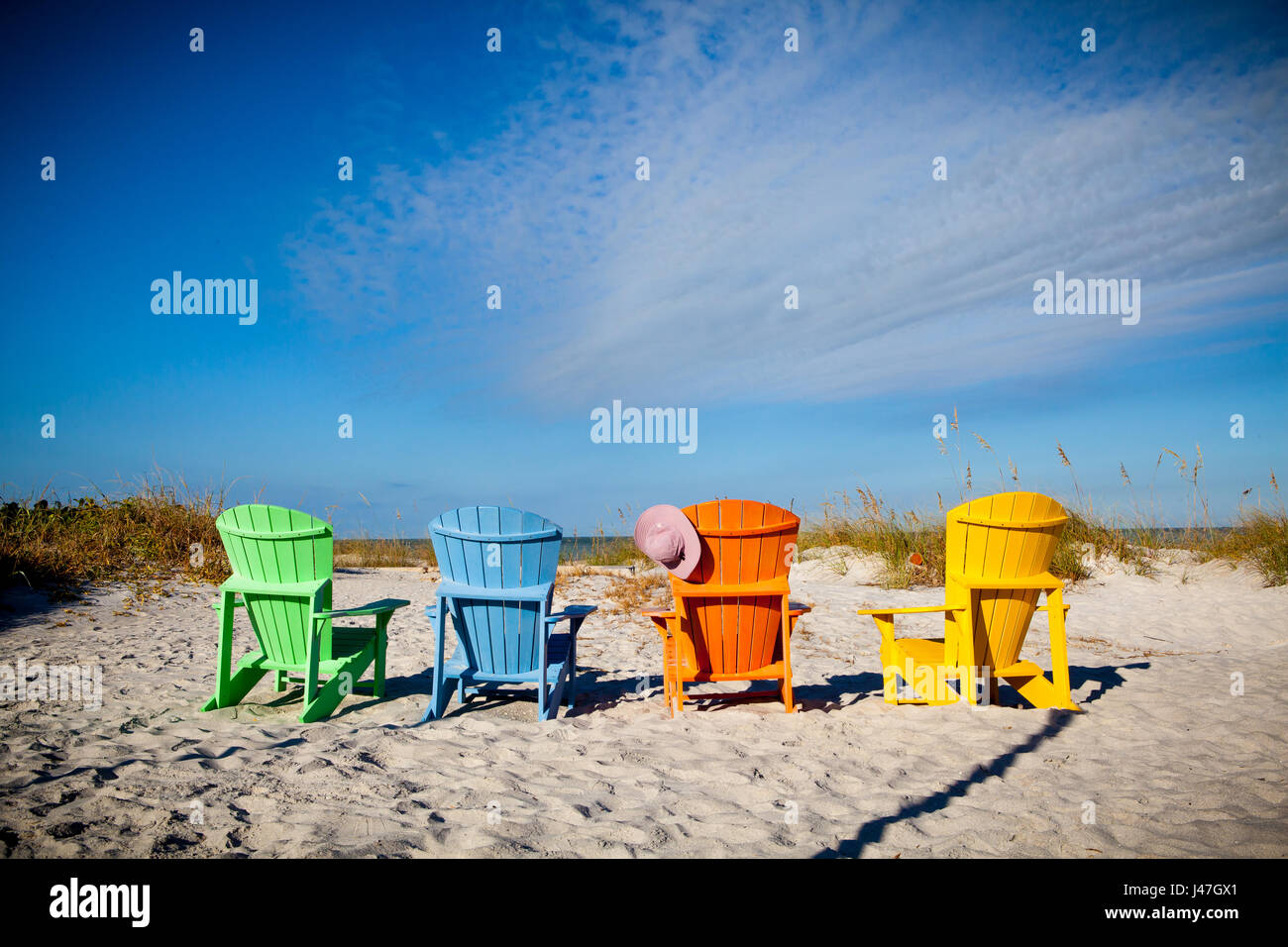 Colorate sedie Adirondack in Florida Foto Stock