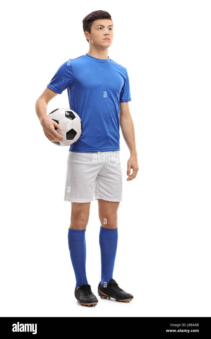 A piena lunghezza Ritratto di un adolescente giocatore di calcio isolati su sfondo bianco Foto Stock