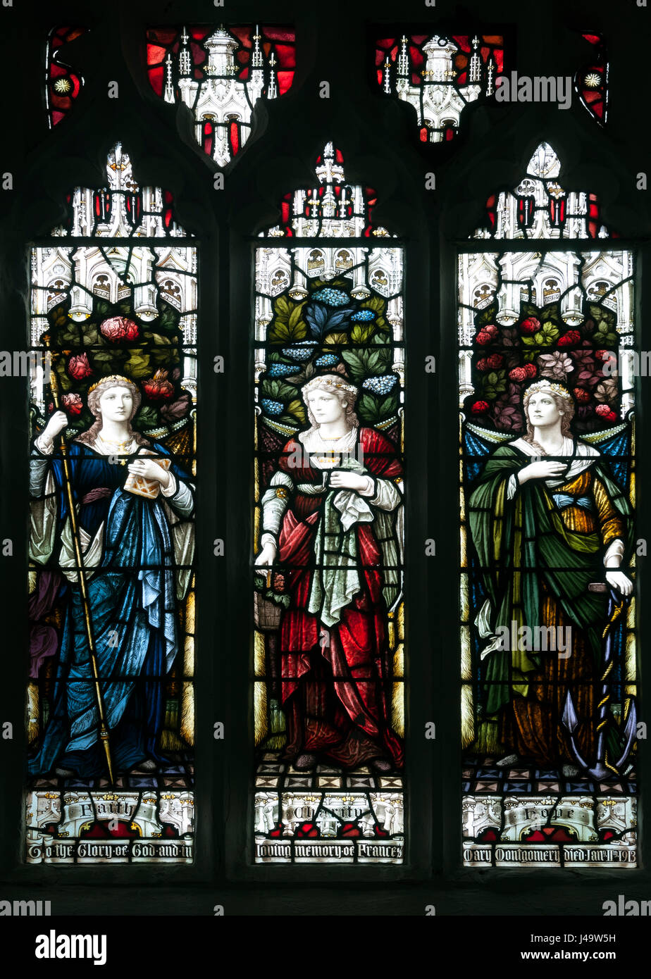 La fede, carità e speranza in vetro colorato, Santa Maria e Chiesa di Tutti i Santi, Holcot, Northamptonshire, England, Regno Unito Foto Stock