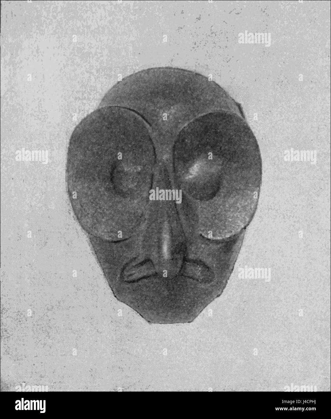 Questa maschera in legno indiana del Delaware in miniatura fa parte della collezione PSM (Popular Science Monthly). Rappresenta l'artigianato indigeno e il significato culturale, mostrando l'arte tradizionale dei nativi americani. Foto Stock