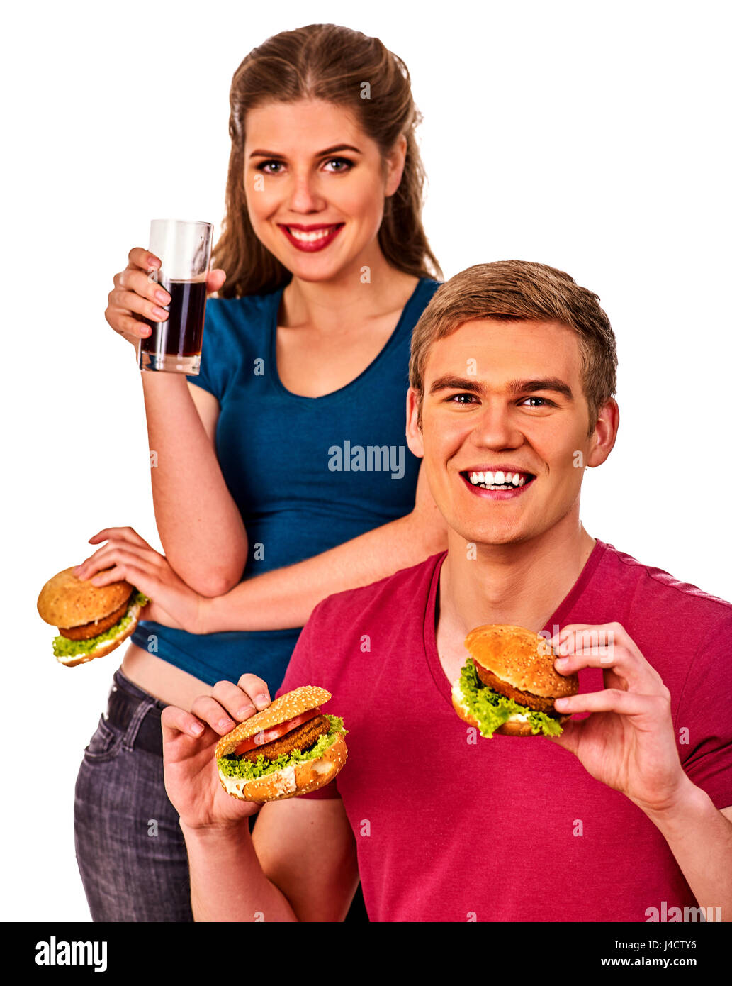 Paio di mangiare fast food. L uomo e la donna il trattamento di hamburger . Foto Stock