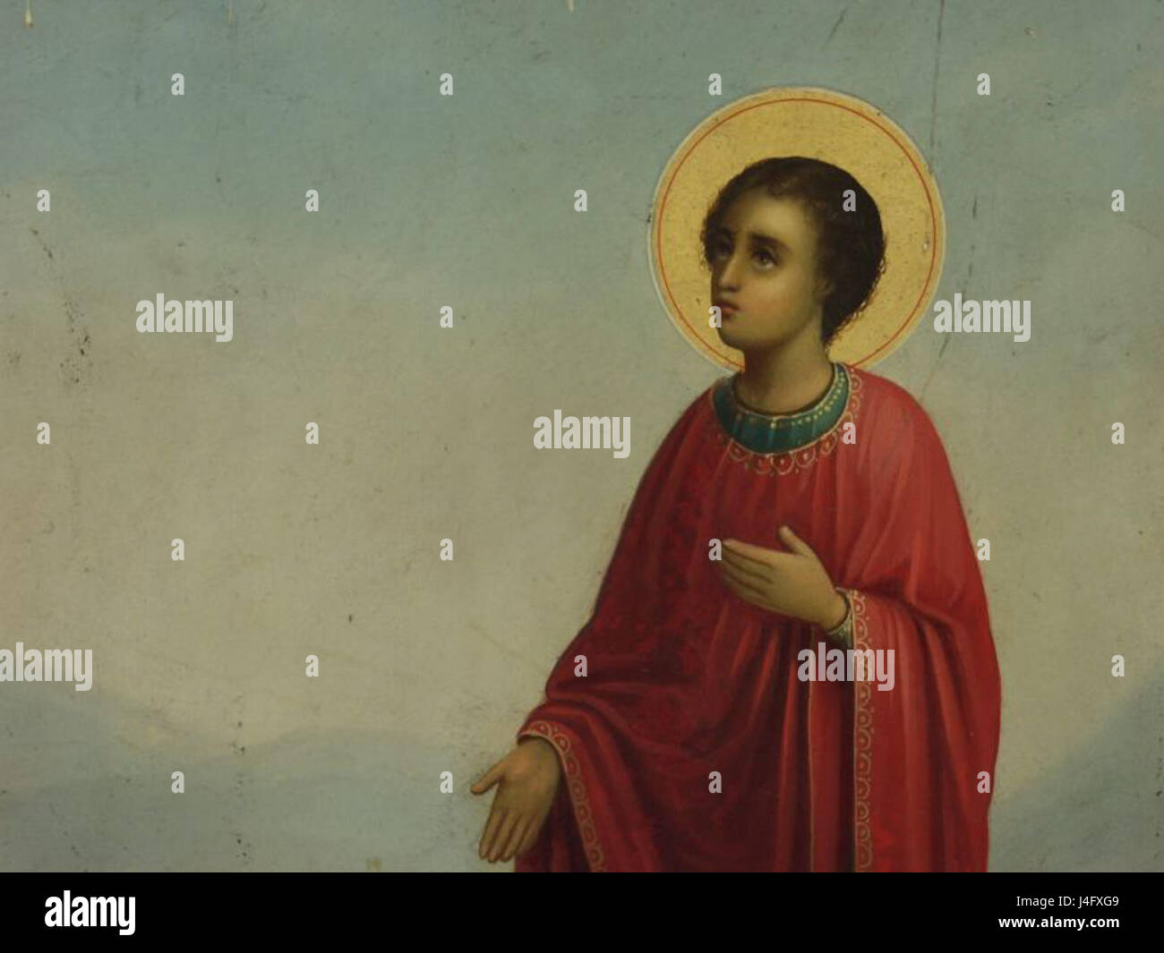 Questa opera del 1893 di Gavril Atanasov raffigura il miracolo di San Panteleimone che resuscita un uomo morto. L'immagine dettagliata mostra l'intervento divino del santo in un momento di significato religioso, con la risurrezione che agisce come tema centrale. Foto Stock