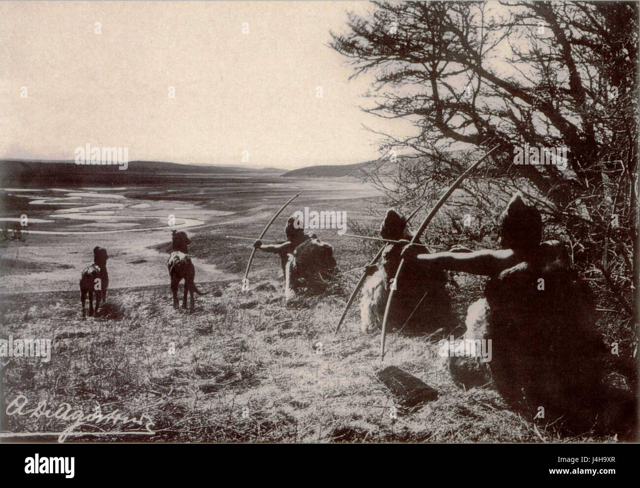 Selknam cazando Foto Stock