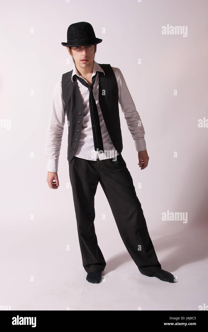 Giovane uomo in studio - fashion shoot Foto Stock