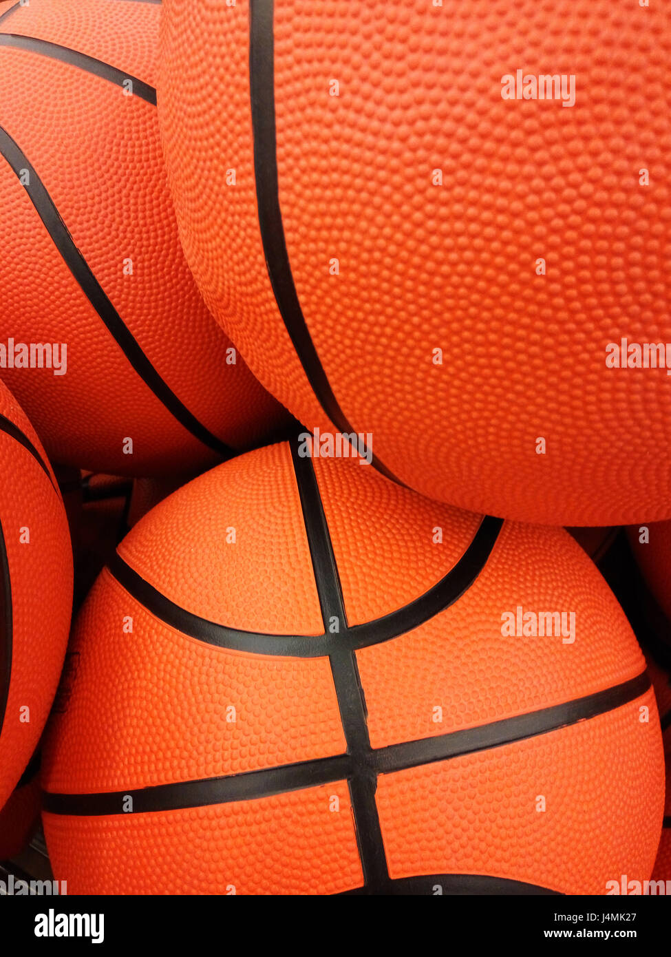 Gli sfondi e texture: gruppo di orange palle da basket, sport abstract Foto Stock