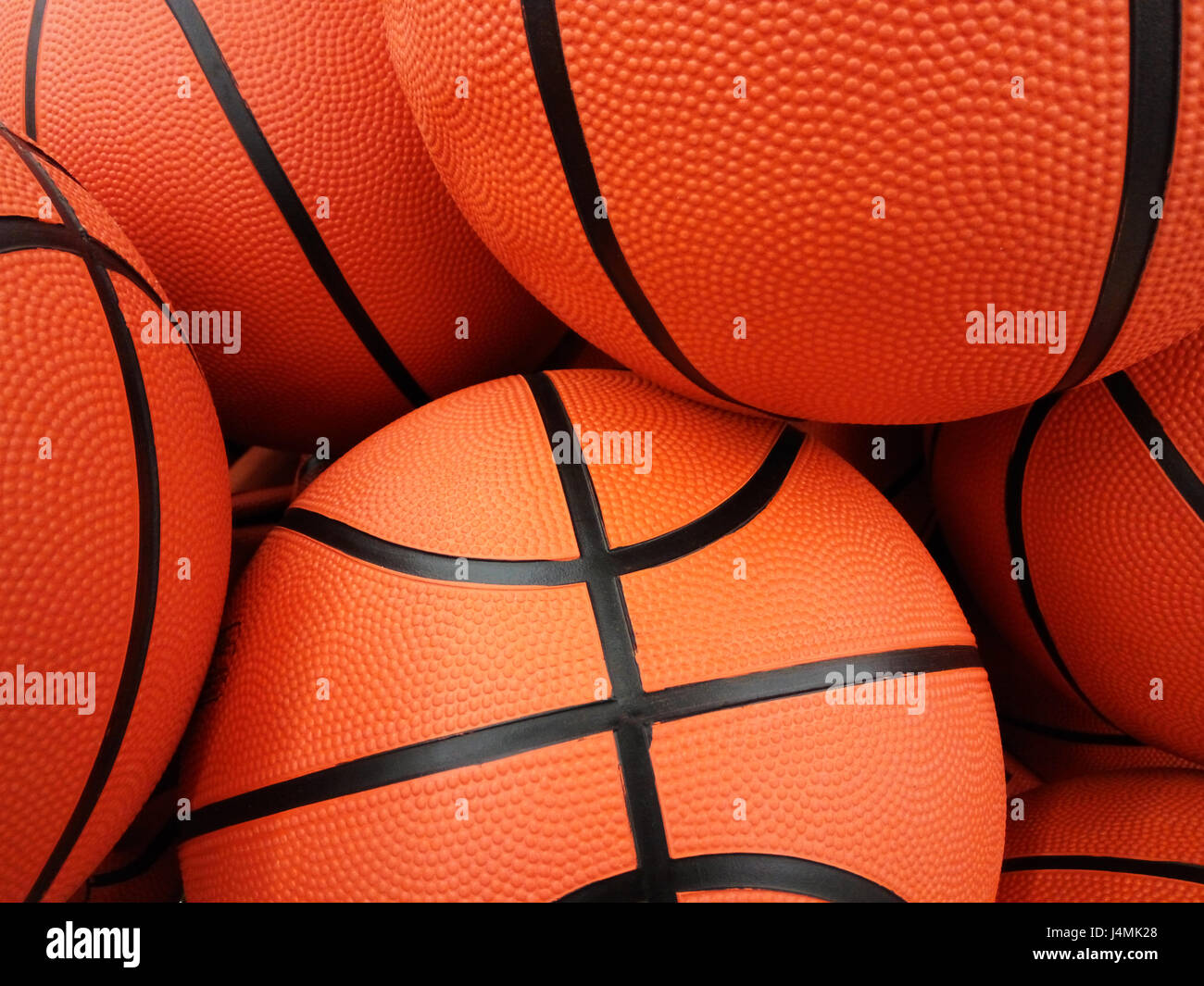 Gli sfondi e texture: gruppo di orange palle da basket, sport abstract Foto Stock