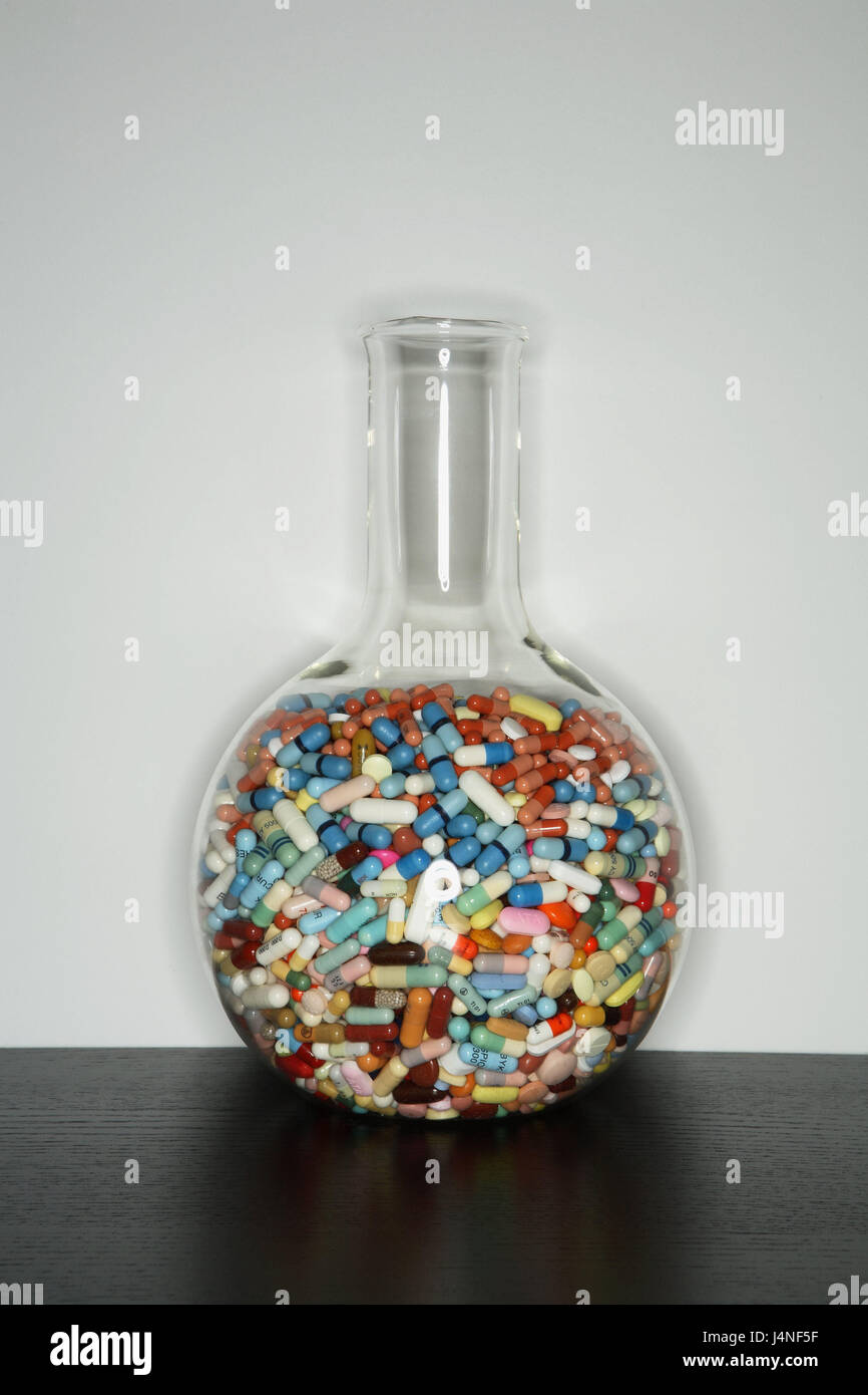 Pallone di vetro, farmaci, mix, tabella, vaso recipiente di vetro, involucro di vetro, pallone, recipiente di laboratorio, beute permanente, ripiene, completamente, Pharmazeutika, pillole, capsule, compresse, dragée, luminosamente, passate, differentemente, enorme numero, scelta in un pasticcio, fuse, tablet cocktail, cocktail di farmaci, la malattia, la guarigione, trattamento, all'interno, Foto Stock