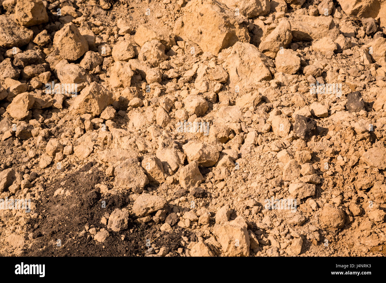 Di argilla e sabbia nella cava. Bellissimo sfondo insolito simile alla superficie del pianeta Marte o la luna Foto Stock