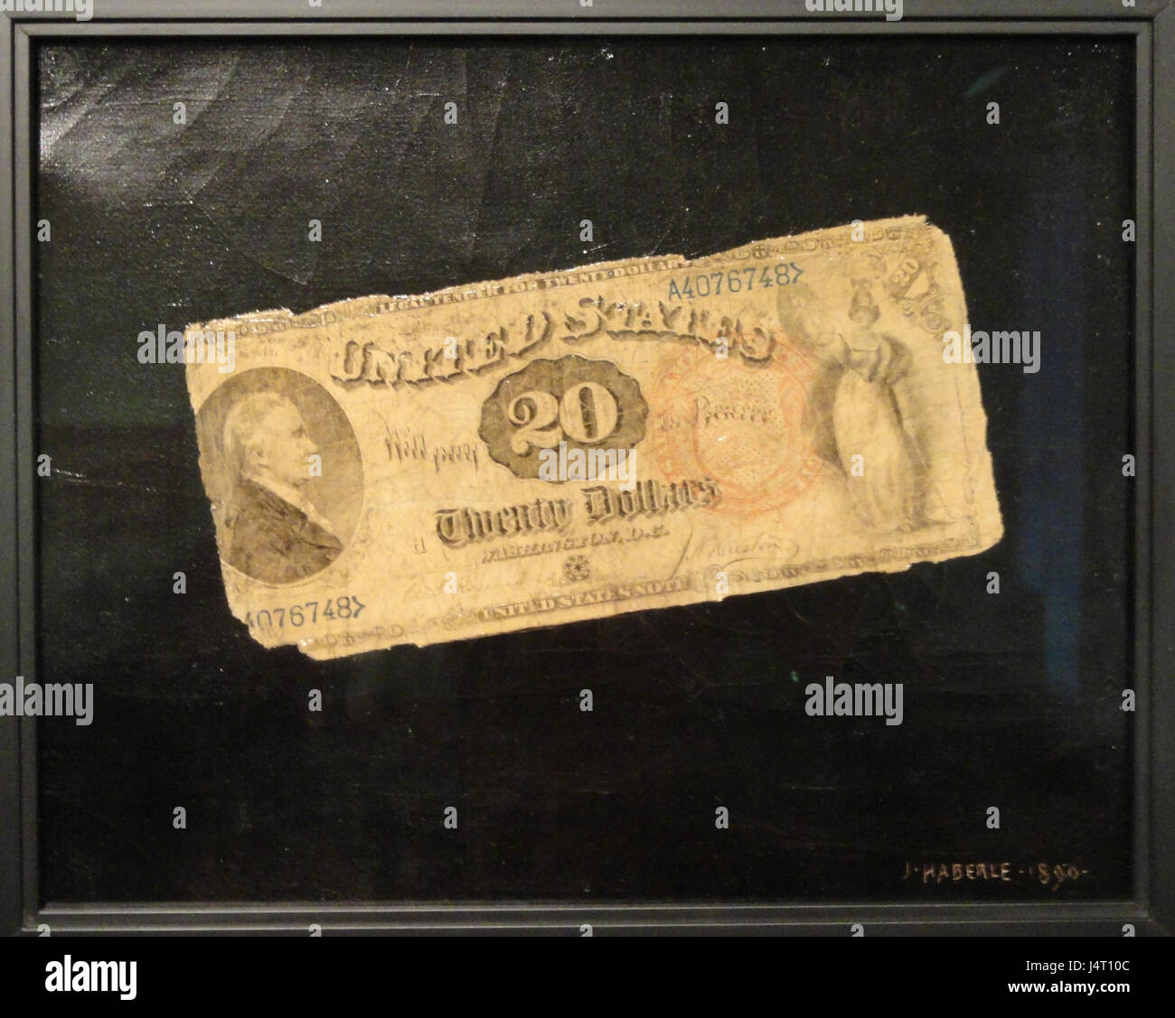 Il dipinto di John Haberle del 1890 di una banconota da venti dollari è un notevole esempio di arte trompe l'oeil, noto per la sua rappresentazione iperrealistica di una banconota di valuta. L'opera d'arte è esposta al Museum of fine Arts di Springfield, ma, mostrando la maestria di Haberle nei dettagli e la precisione nella creazione di rappresentazioni realistiche di oggetti di uso quotidiano. Foto Stock